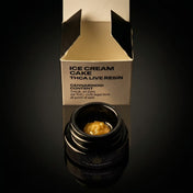 Thca live resin with packaging labeled 'Ice Cream Cake THCA Live Resin' on a black background.